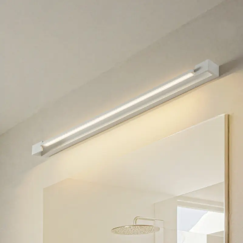 Billigare Arcchio LED-vägglampa Jora, 90 cm, vit, vridbar, IP44
