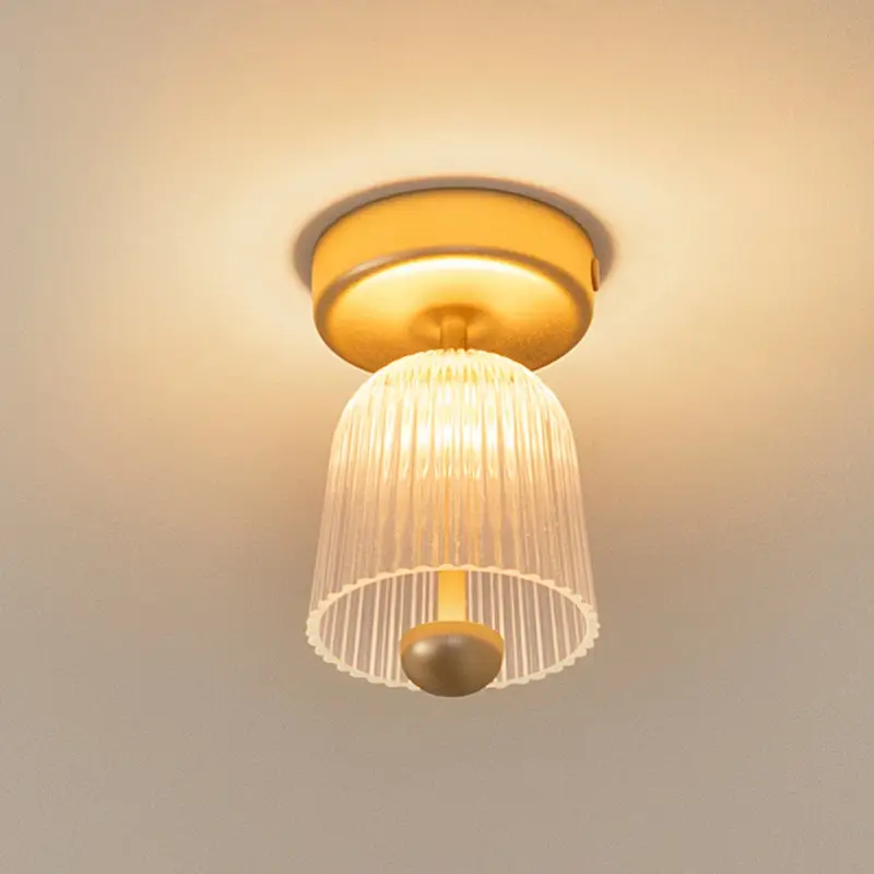 Rea Nuura LED-taklampa Asteea, Ø 12 cm, mässingsfärgad/klar